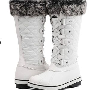 Brand new women’s waterproof boots.